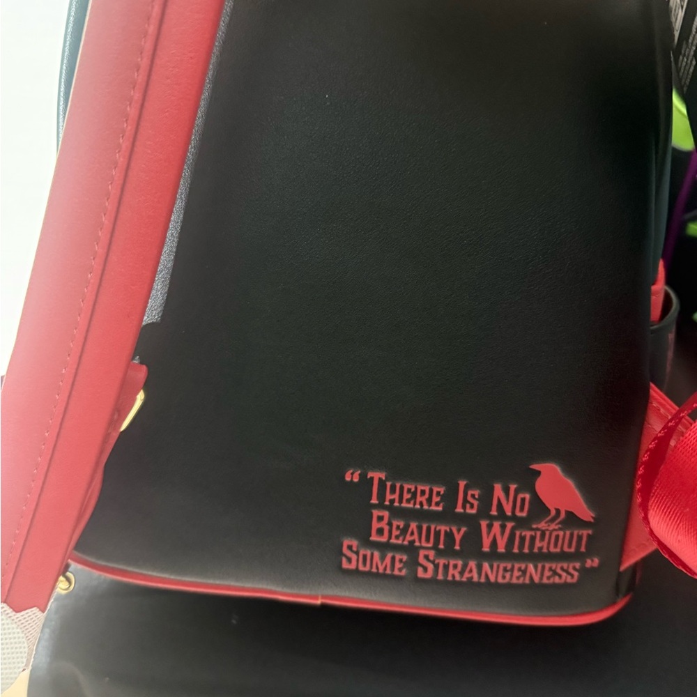 Loungefly Black and Red Book-Themed Backpack - Picture 2 of 2